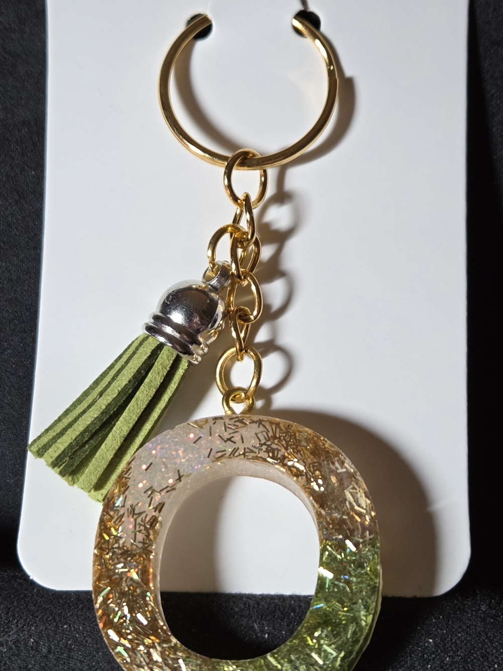 Gold-Tone Glitter Resin O-Ring Keychain with Olive Tassel